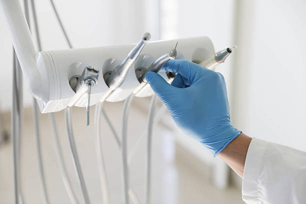 Professional Tooth Extraction technician working in Lexington, WA